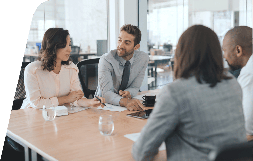 a group of people sitting at a table