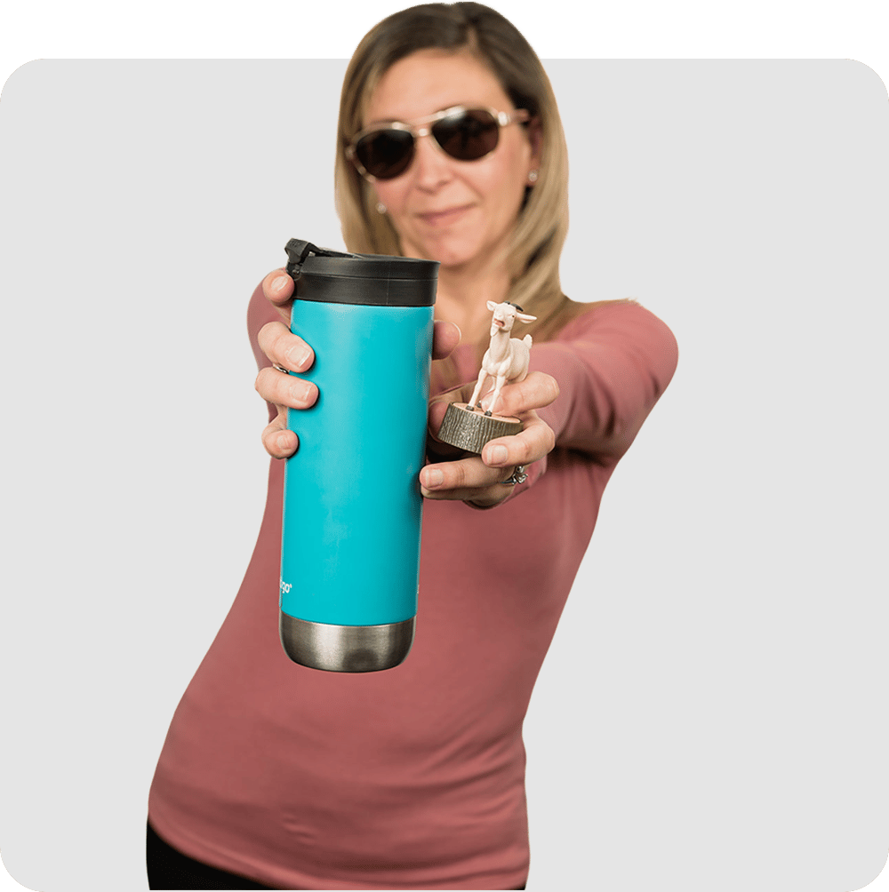 Professional woman holding an insulated cup