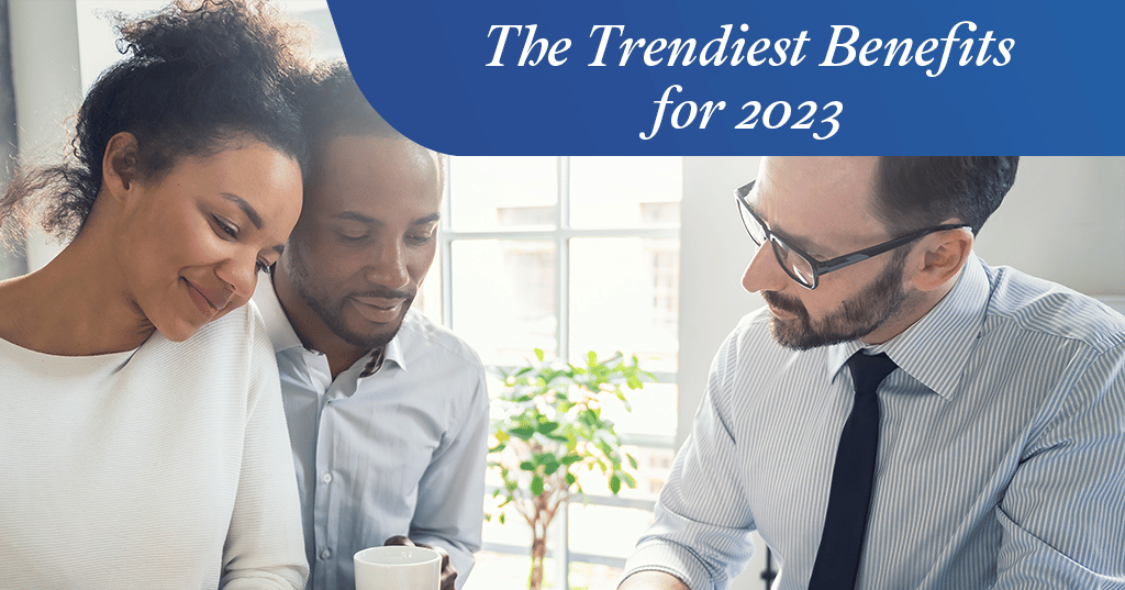 Three professionals considering the trendiest benefits for 2023